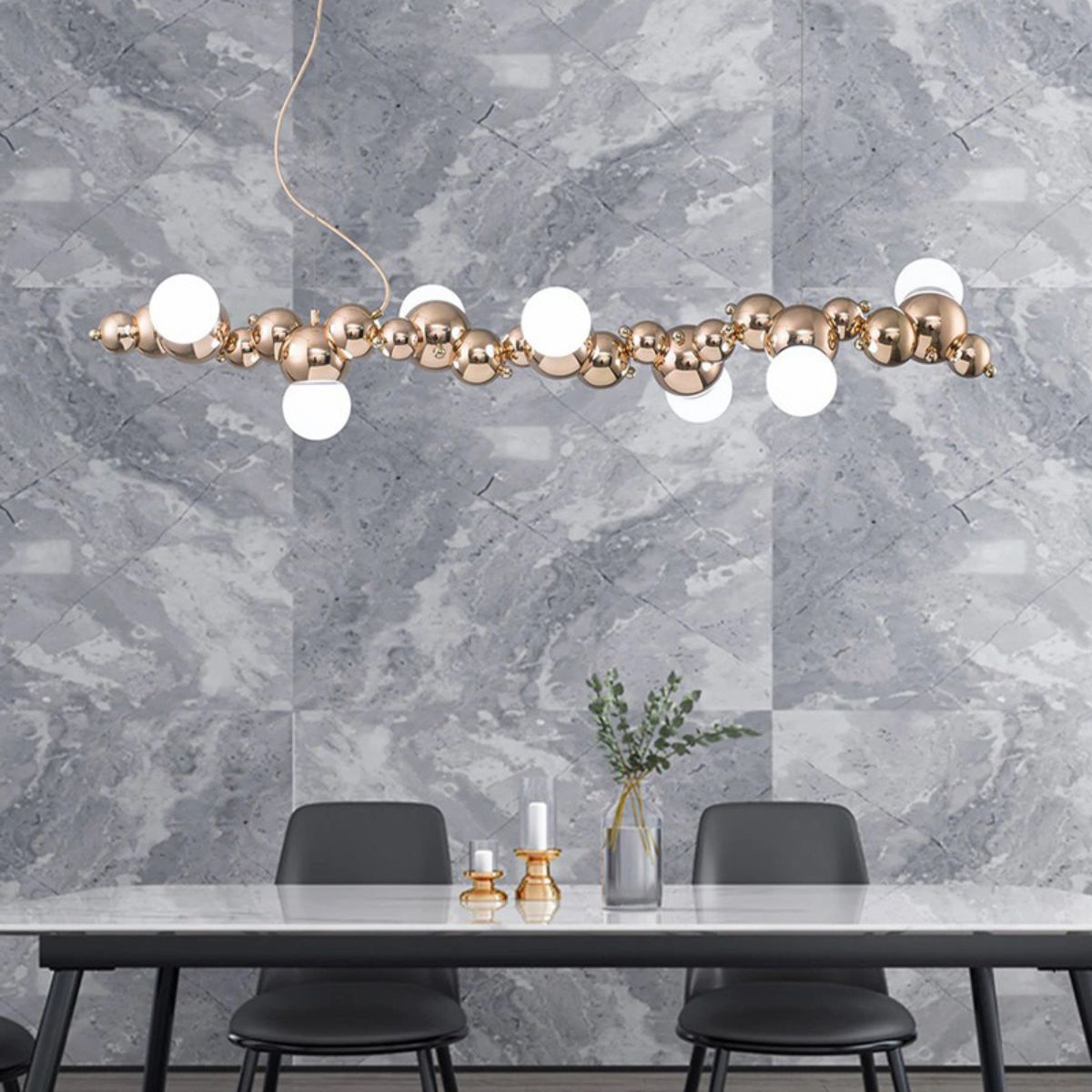 Radiance chandelier light fixture installed above kitchen island, providing elegant and functional lighting for dining and cooking areas