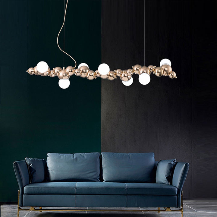 Radiance kitchen island chandelier light fixture installed in a modern living room, providing elegant ambient lighting with contemporary style