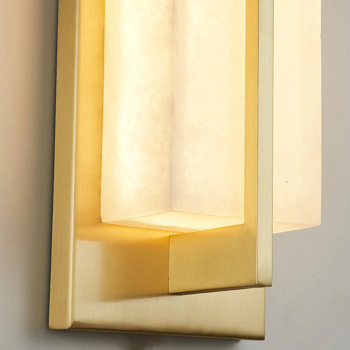 Rectangular alabaster brass wall sconce luxury lighting close-up detail view elegant decor