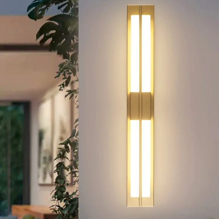 Rectangular alabaster brass wall sconce luxury lighting turned on front view elegant decor