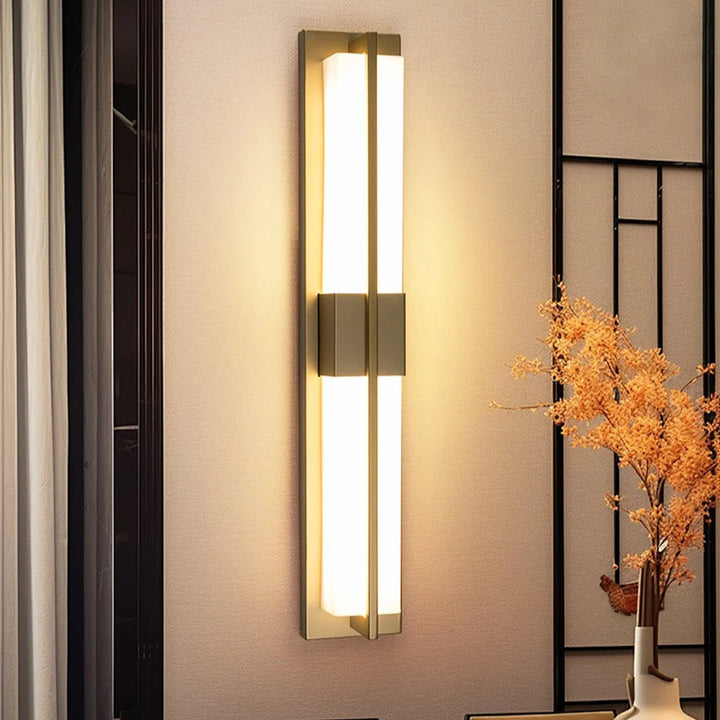 Rectangular alabaster brass wall sconce luxury lighting turned on side angle view modern decor