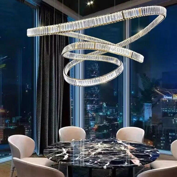 Reflected chandelier light above dining table in Australia, creating a stylish ambiance with shimmering reflections