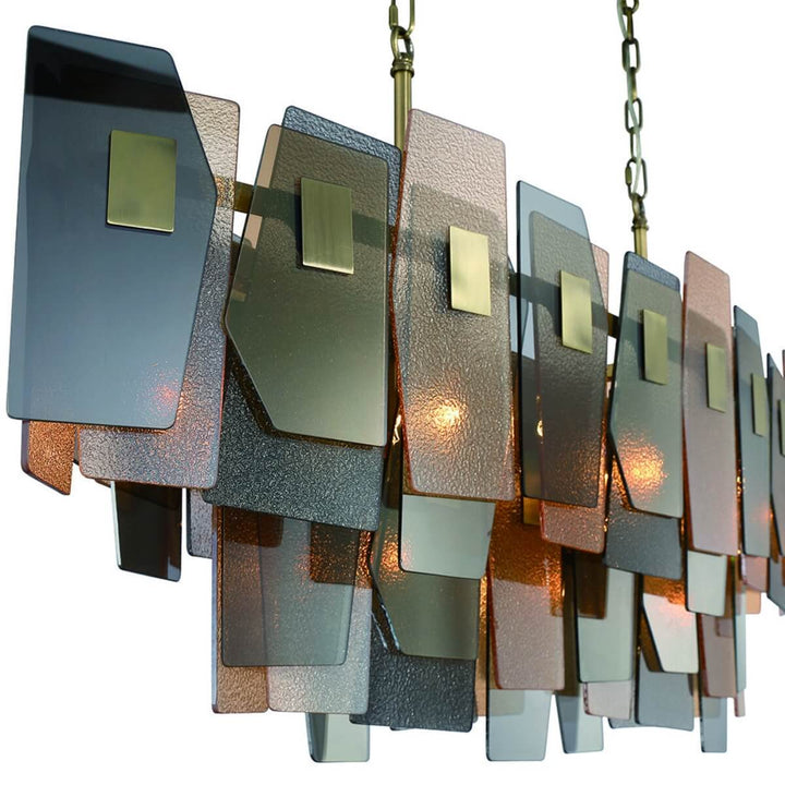 Detailed close-up of Renato 11-bulb rectangular chandelier with amber smoky glass – showcasing textured glass and elegant metal frame craftsmanship.