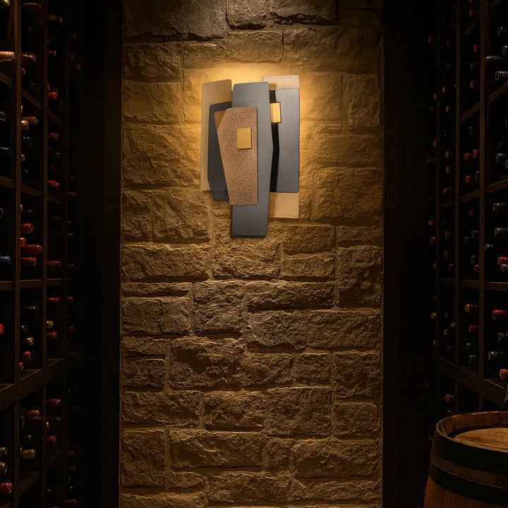 Renato wall light with bronze finish and amber smoke glass shown mounted on wall view