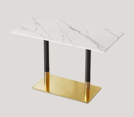 Modern restaurant table featuring sleek marble surface and sturdy legs