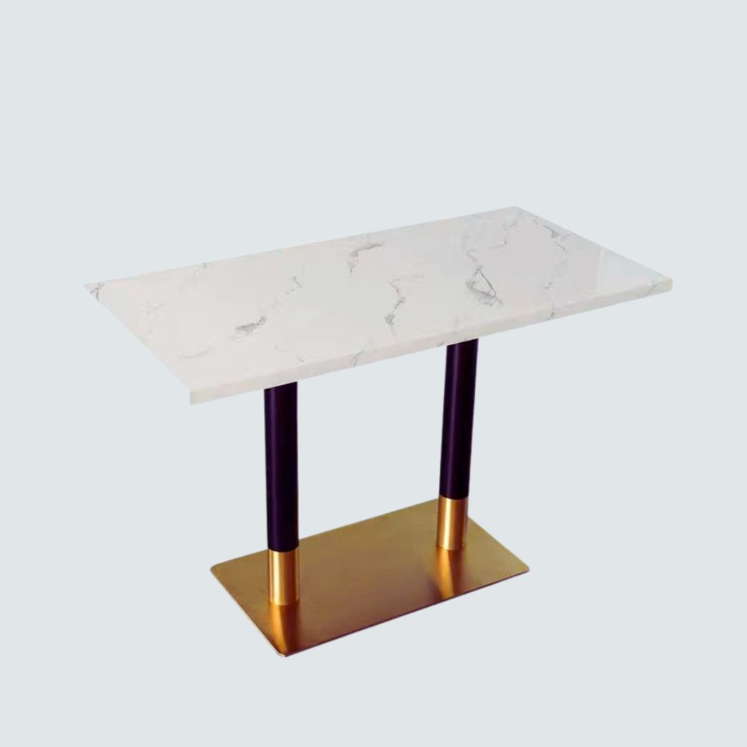 Modern restaurant table featuring sleek marble surface and sturdy legs