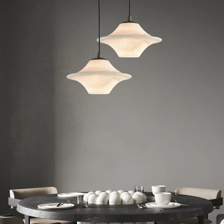 Saucer Alabaster Pendant Light above dining table top view modern elegant ceiling lamp fixture