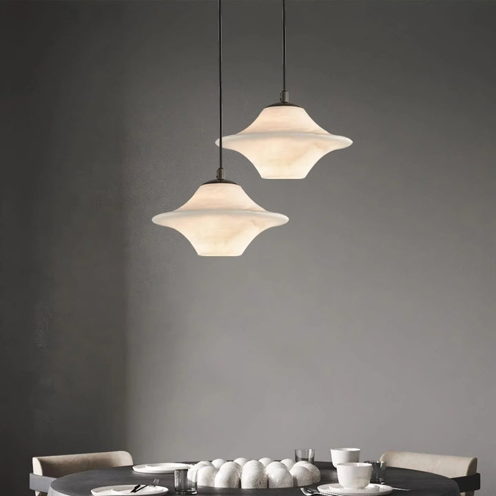 Saucer Alabaster Pendant Light hanging over dining table modern elegant ceiling lamp for interiors