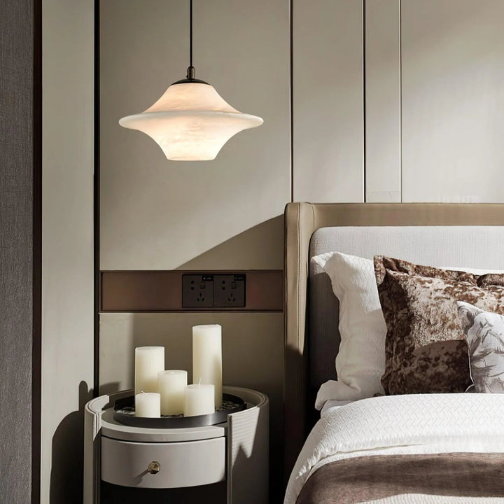 Bedside hanging view of Saucer Alabaster Pendant Light illuminated modern elegant ceiling lamp