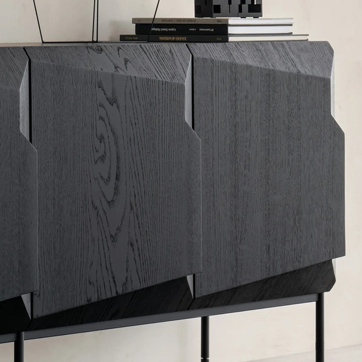 Side angle view of Scala luxury sideboard in solid oak with black finish, showcasing sleek design and spacious storage