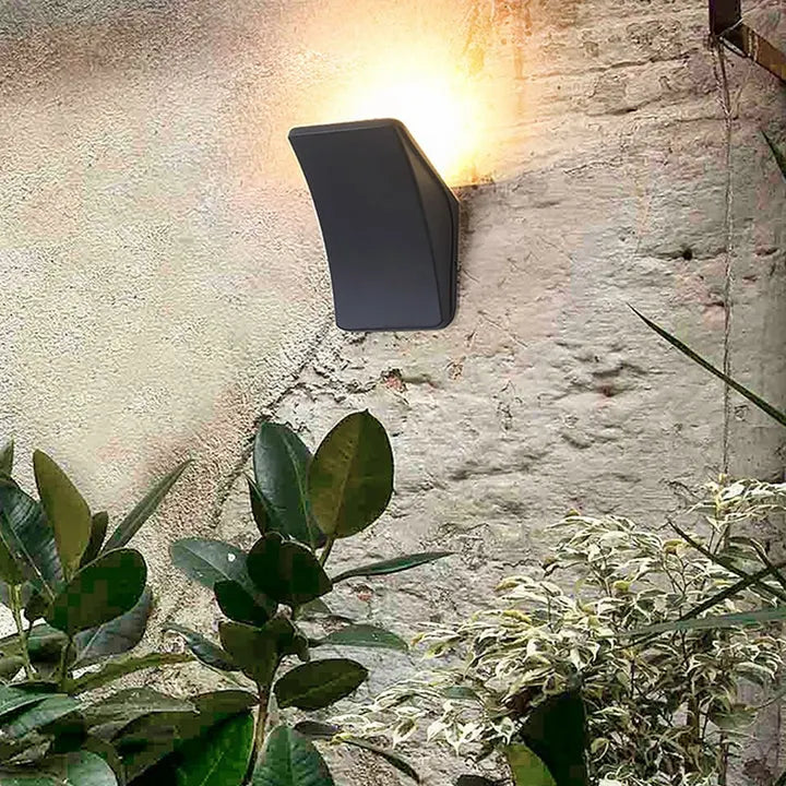 Outdoor view of SHADOW CREST LED Wall Light – Contemporary and energy-efficient lighting for gardens, patios, and walkways.