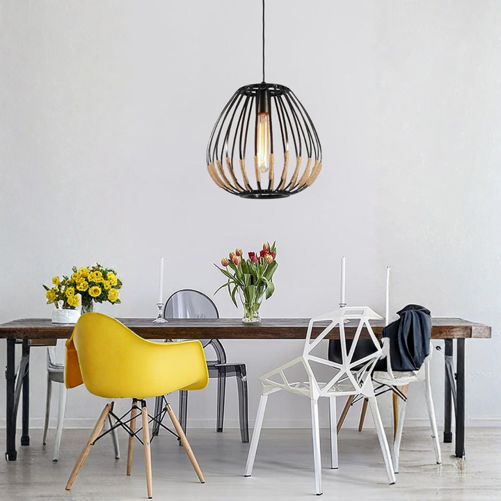 Silklush small sleek black modern pendant light hanging above dining table in stylish setup