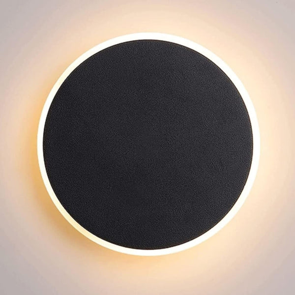 SleekSphere round LED touch wall lamp – modern minimalist lighting with touch control and soft ambient glow.