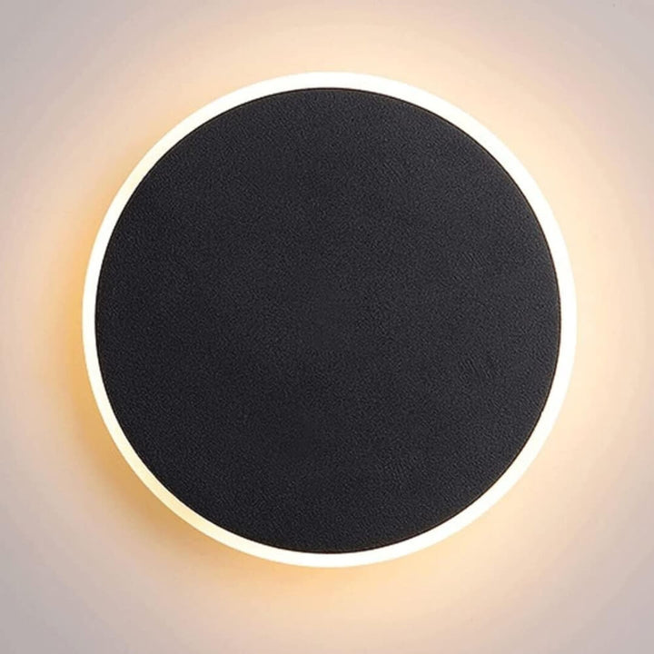 SleekSphere round LED touch wall lamp – modern minimalist lighting with touch control and soft ambient glow.
