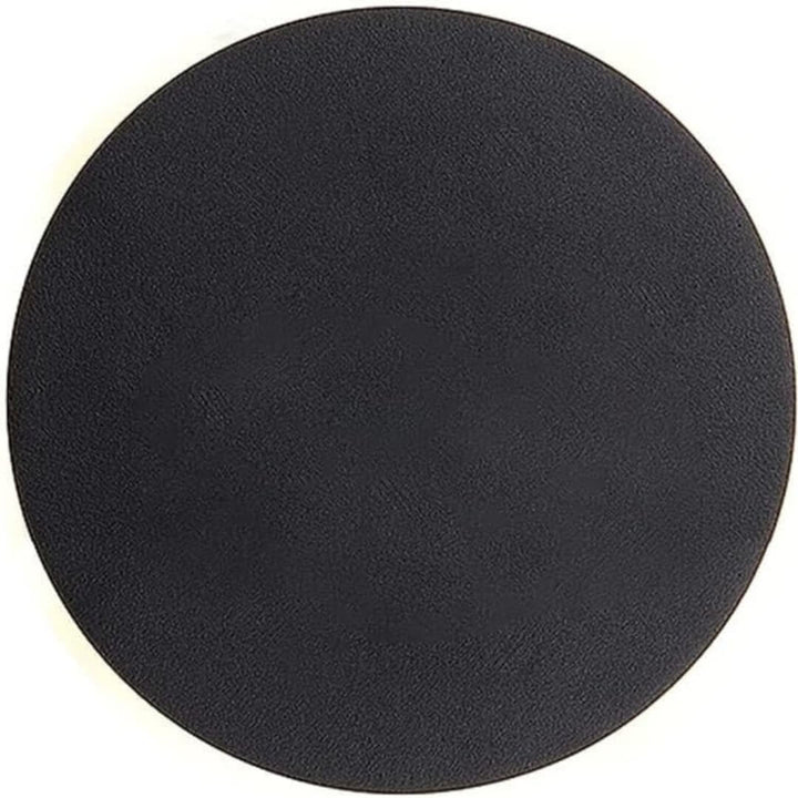 SleekSphere LED wall lamp – modern circular light.