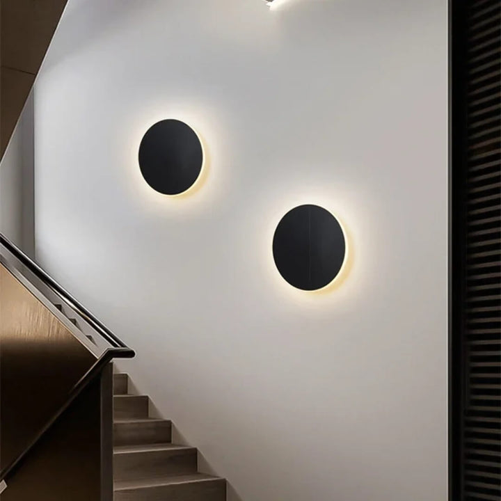SleekSphere round LED touch wall lamp installed along staircase – modern minimalist lighting solution for safe and stylish stair illumination.