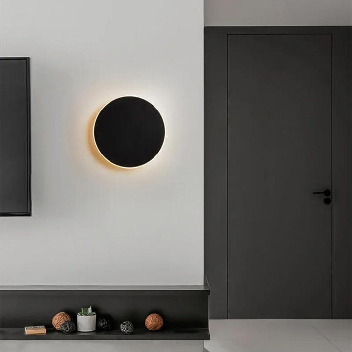 SleekSphere LED wall lamp – modern circular light.