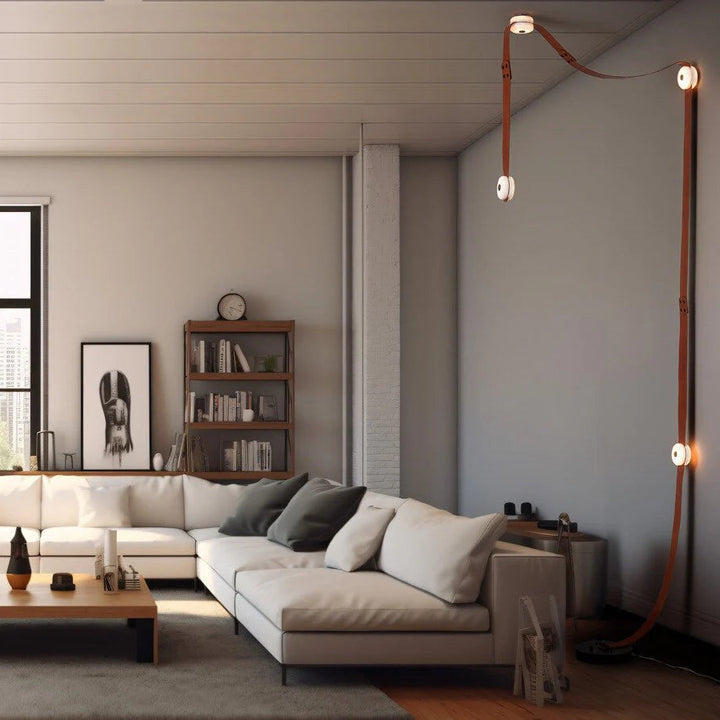 Snaps alabaster pendant light wall-mounted with ceiling view in living room, gold metal accents, modern design