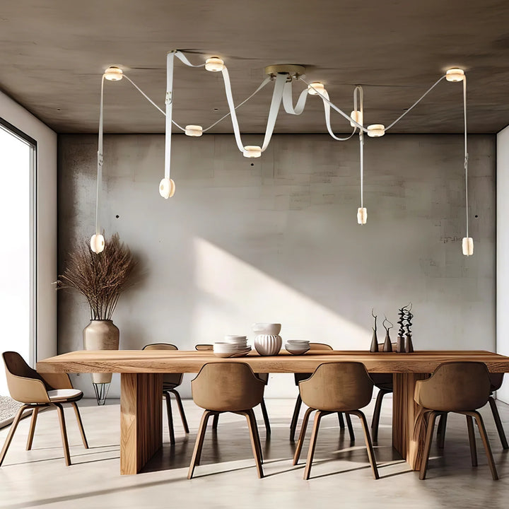 Snaps alabaster pendant light hanging from ceiling in dining area, elegant marble modern lighting
