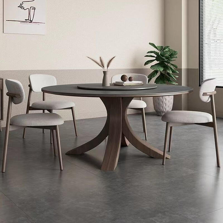 Close-up view of solid wood dining table with built-in Lazy Susan, highlighting natural wood texture and craftsmanship