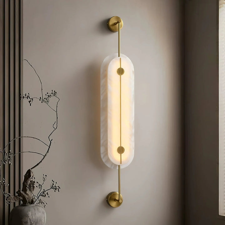 Solvane modern wall sconce light side view, showcasing elegant minimalist design for stylish interiors
