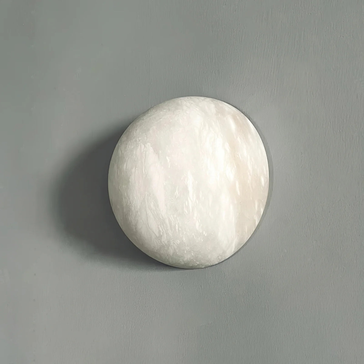Side view of Spanish alabaster snowflake wall sconce, elegant wall-mounted lighting fixture for décor