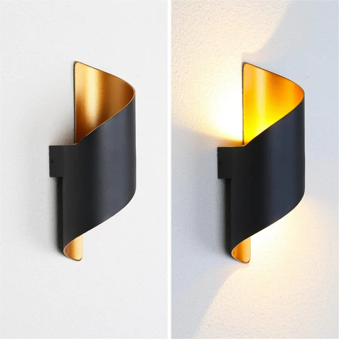 Spiral outdoor wall light in black and gold, IP65 weatherproof, perfect for modern outdoor lighting.