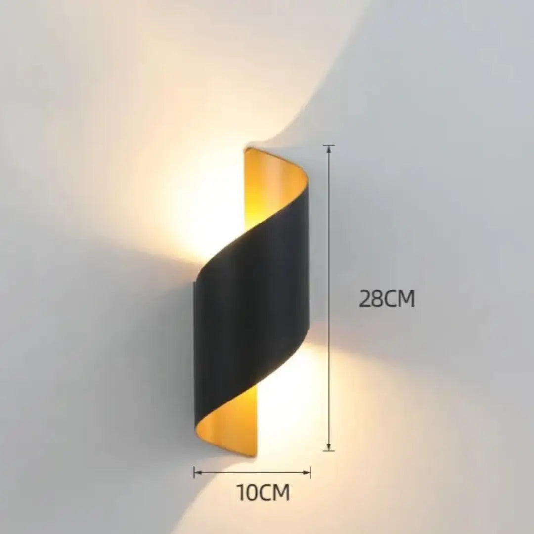 Spiral outdoor wall light in black and gold, IP65 rating, durable and stylish for outdoor spaces.