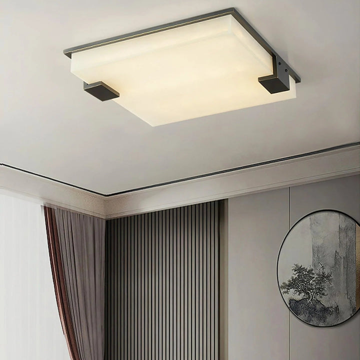 Below view of modern square alabaster ceiling lamp for elegant home lighting