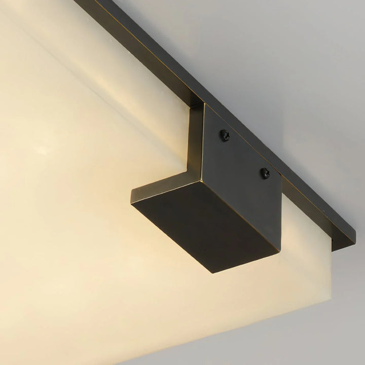 Detailed view of modern square alabaster ceiling lamp highlighting hollow marble design