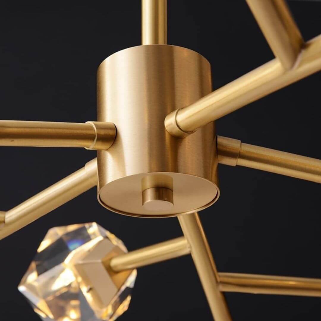 Close-up detail view of starburst diamond-shaped chandelier light’s copper connector showcasing quality craftsmanship