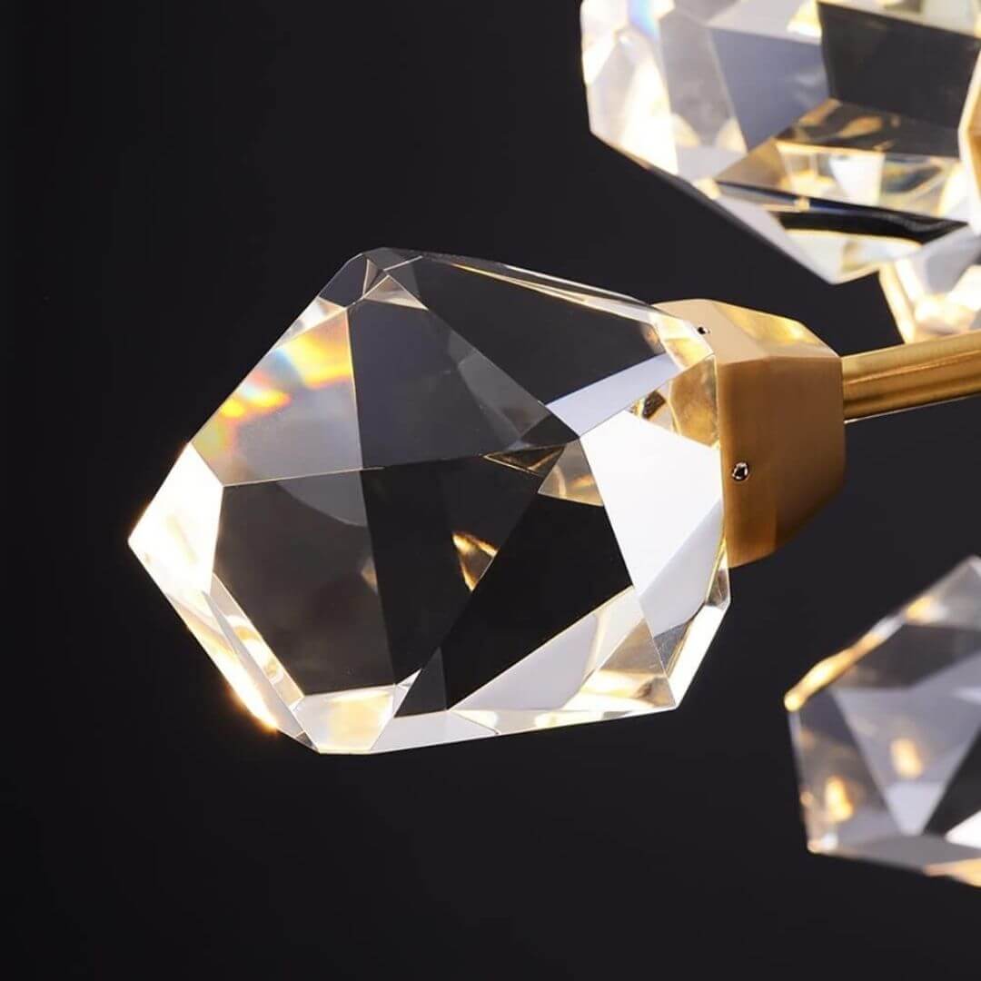 Close-up crystal detail view of starburst diamond-shaped chandelier light highlighting sparkling facets and design