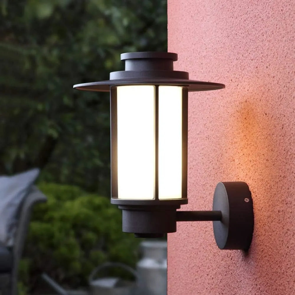 Side view of STEEL HALO Outdoor Wall Light – Stylish die-casting aluminum construction with opal PC diffuser for efficient outdoor illumination.