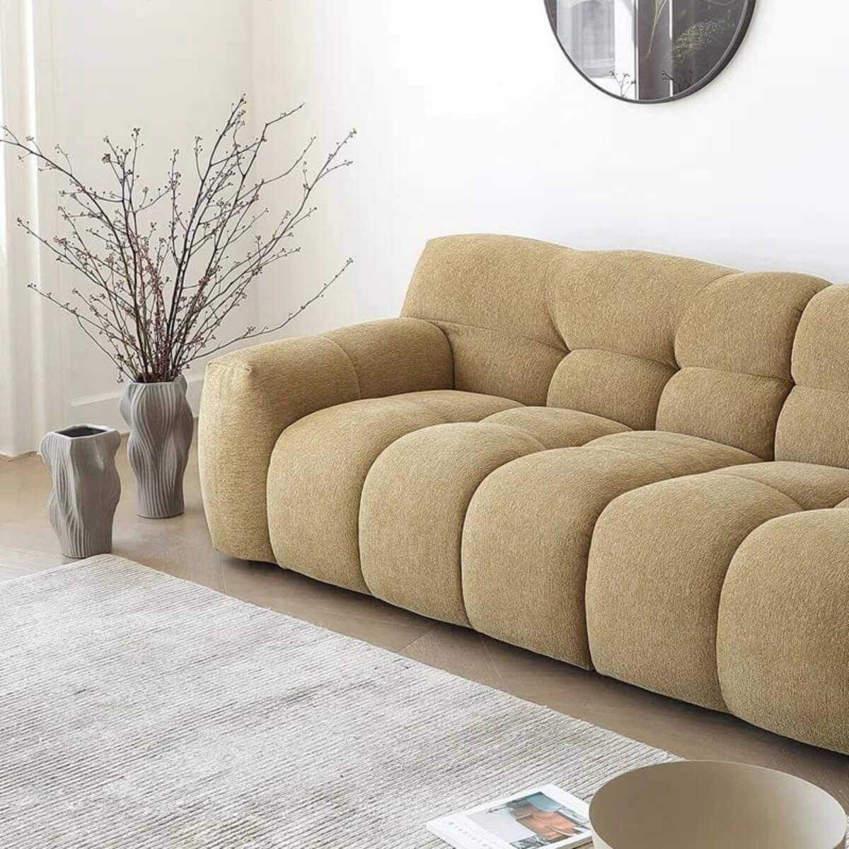Left side view of Stylish Modernista KS07 three-seater sofa featuring cotton-linen upholstery – elegant design with plush cushions and clean lines