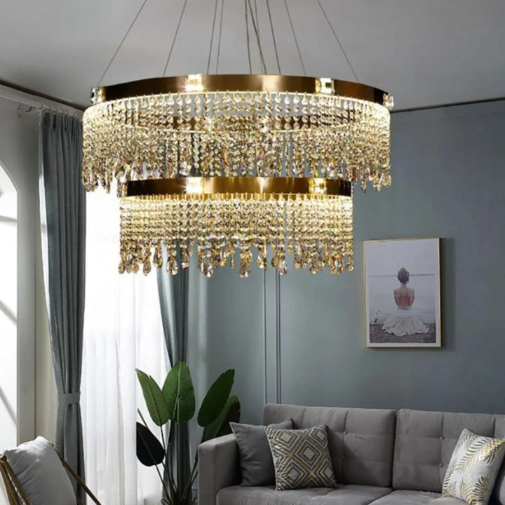 Tinsel chandelier light hanging in living room, adding festive sparkle and elegant ambiance to the space