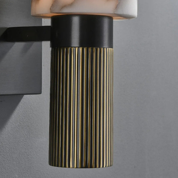 Close-up of metal base in torch alabaster wall sconce lighting