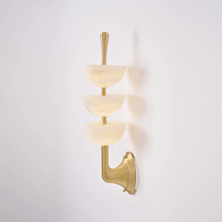 Side view of Triple Alabaster Wall Sconce with golden metal, luxury lighting, elegant home décor