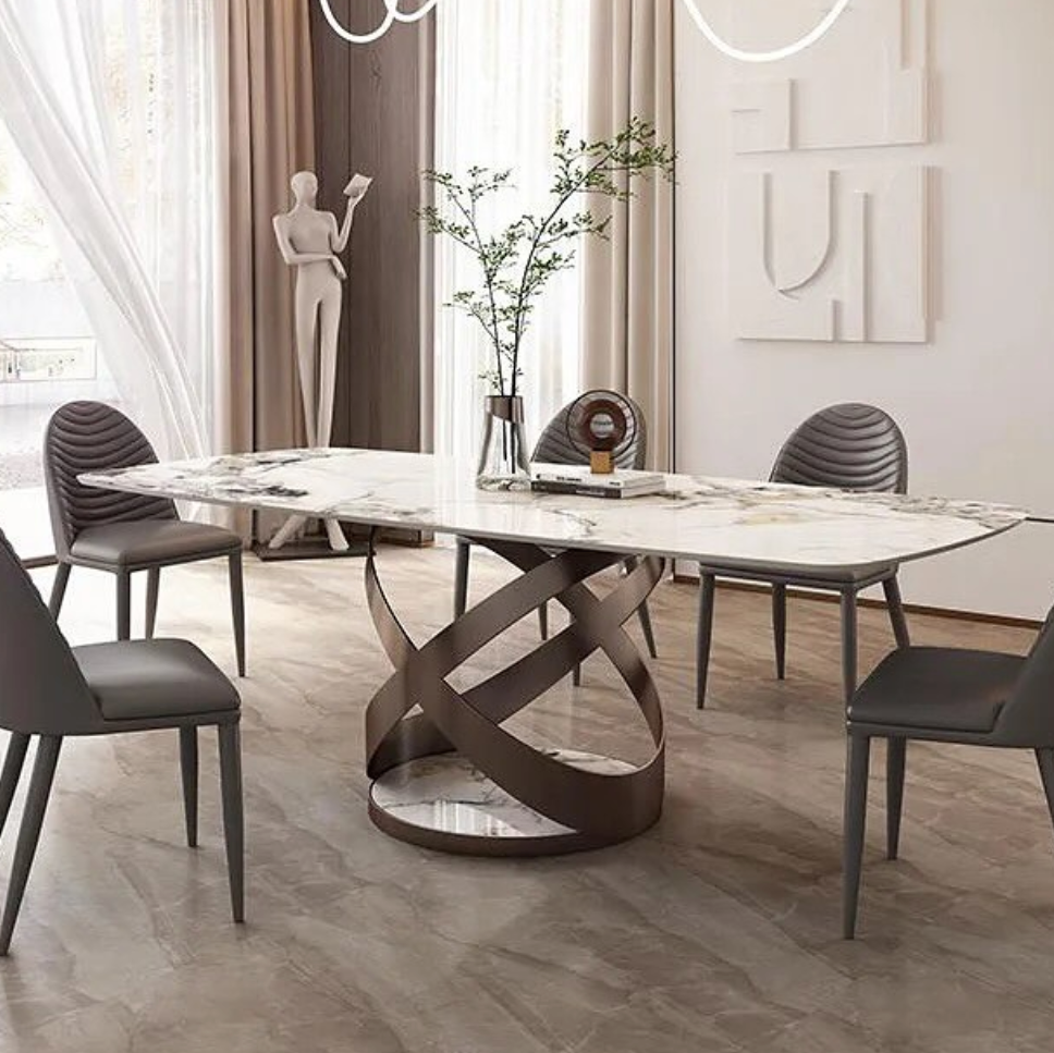 Marble dining table with elegant tripod base, combining luxurious stone top with modern minimalist support structure