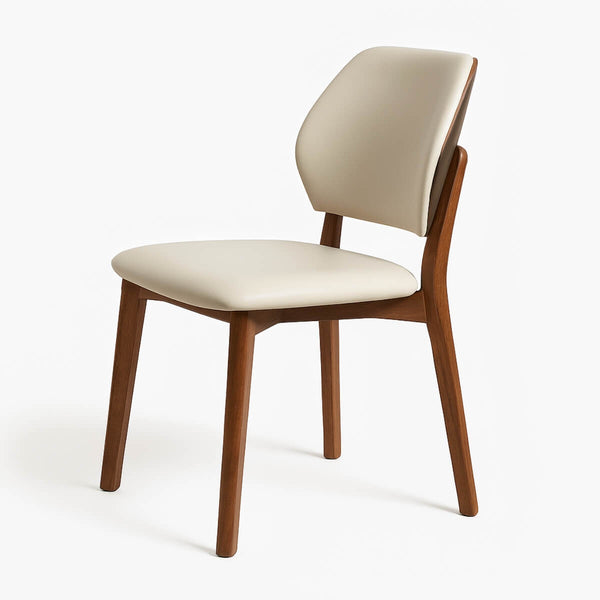 Valora walnut dining chair, front hero view with cushioned seat.