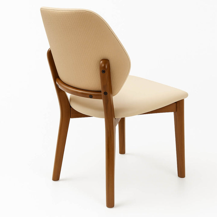 Front hero view of Valora walnut dining chair featuring sleek wooden frame and comfortable cushioned seat.