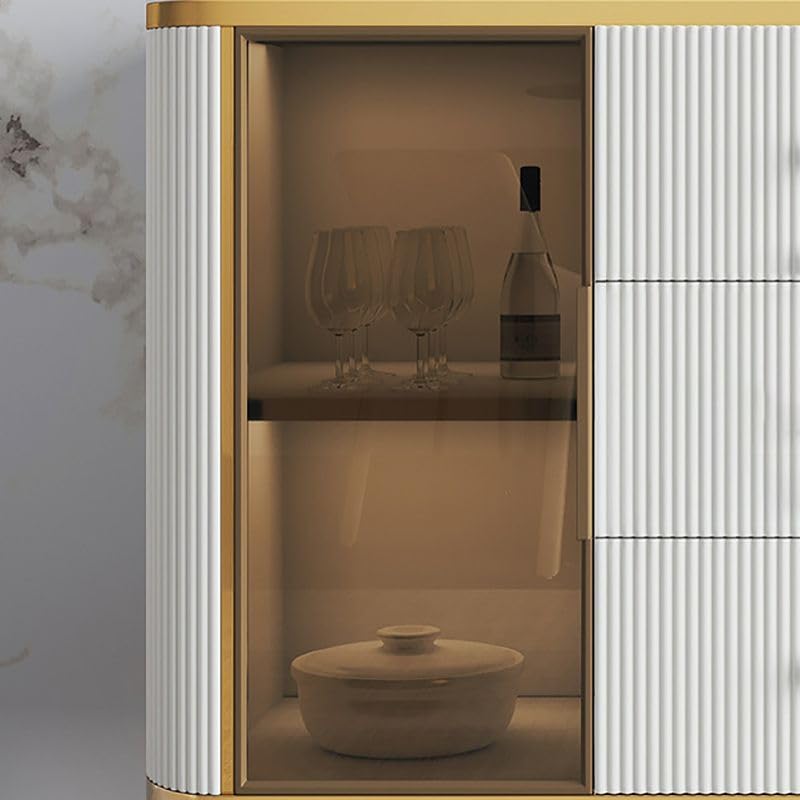 Left side view of Vandana buffet table featuring glass panel detail, smooth wood finish, and modern design