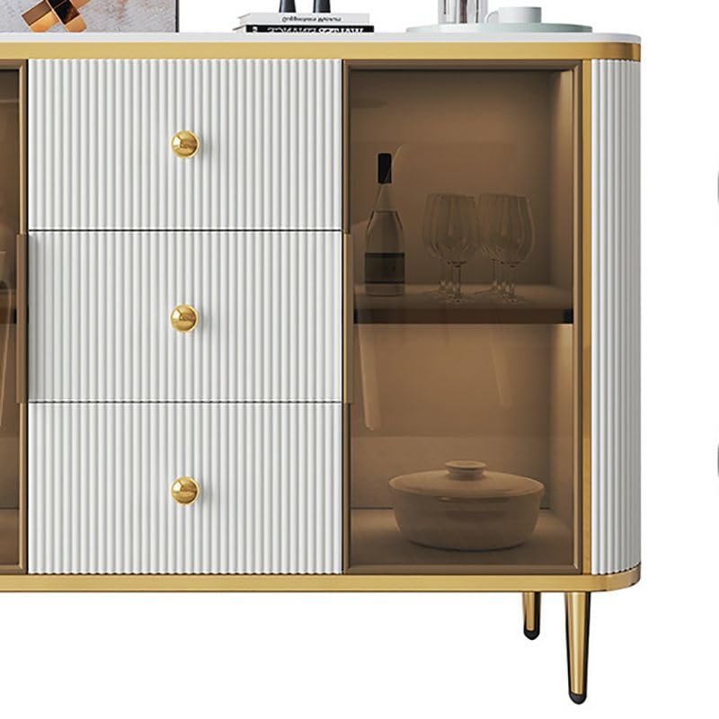 Right side view of Vandana buffet table featuring glass panel detail, smooth wood finish, and modern design
