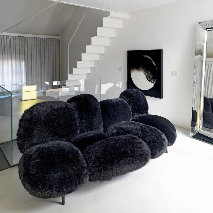 Left side view of Velvet Veritas KS34 sofa – featuring soft velvet upholstery, deep seating, and a modern elegant silhouette