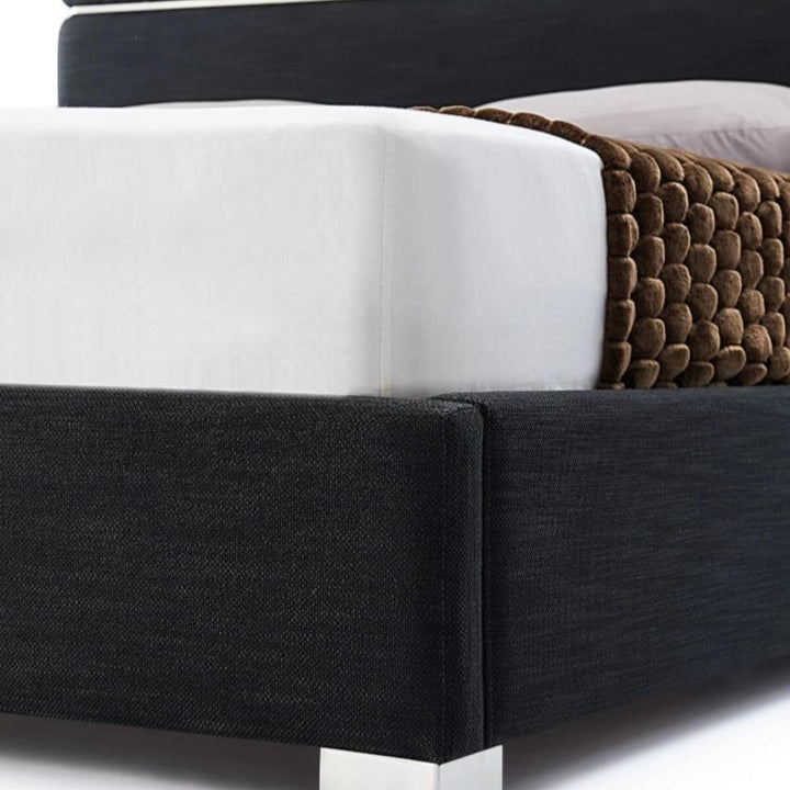 Close-up of Velvet Vista luxurious velvet bed corner showcasing plush fabric texture and sturdy frame