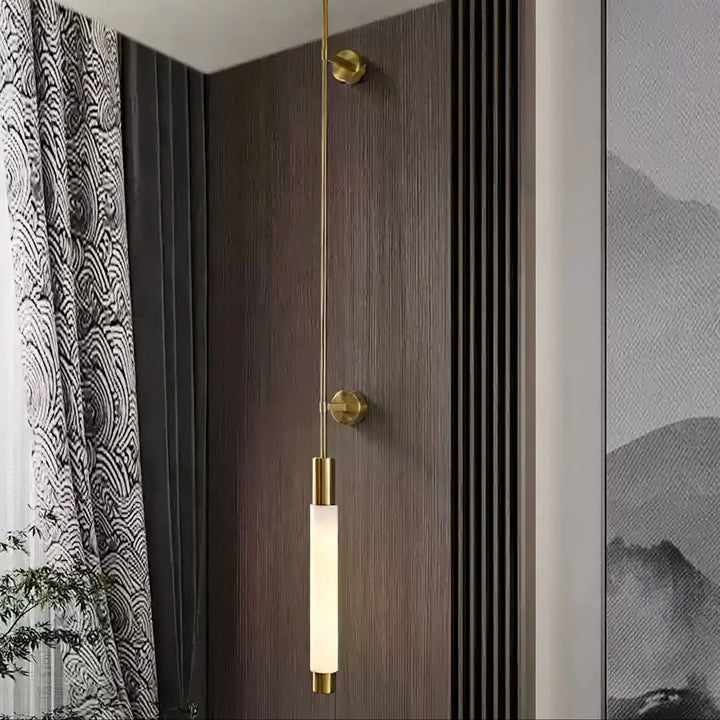 Front view of Verita alabaster wall sconce with golden finish for elegant home décor lighting