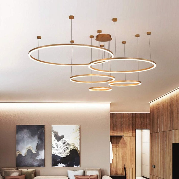 Vivid 5-ring circular chandelier light hanging in a contemporary living room, offering elegant ambient illumination and modern design appeal
