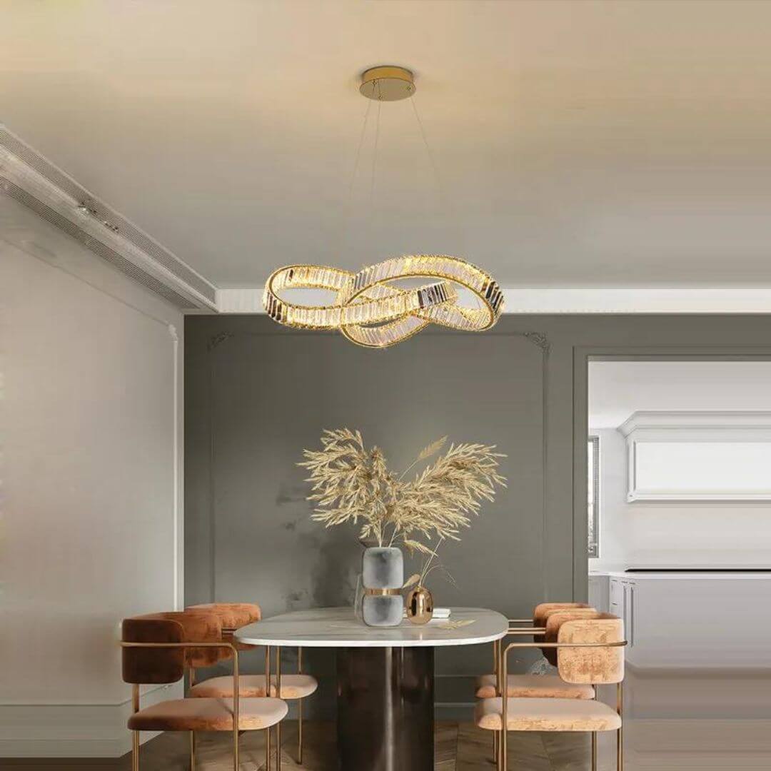 Vivid twisted crystal chandelier light above dining table in luxury room, enhancing elegant and radiant ambiance