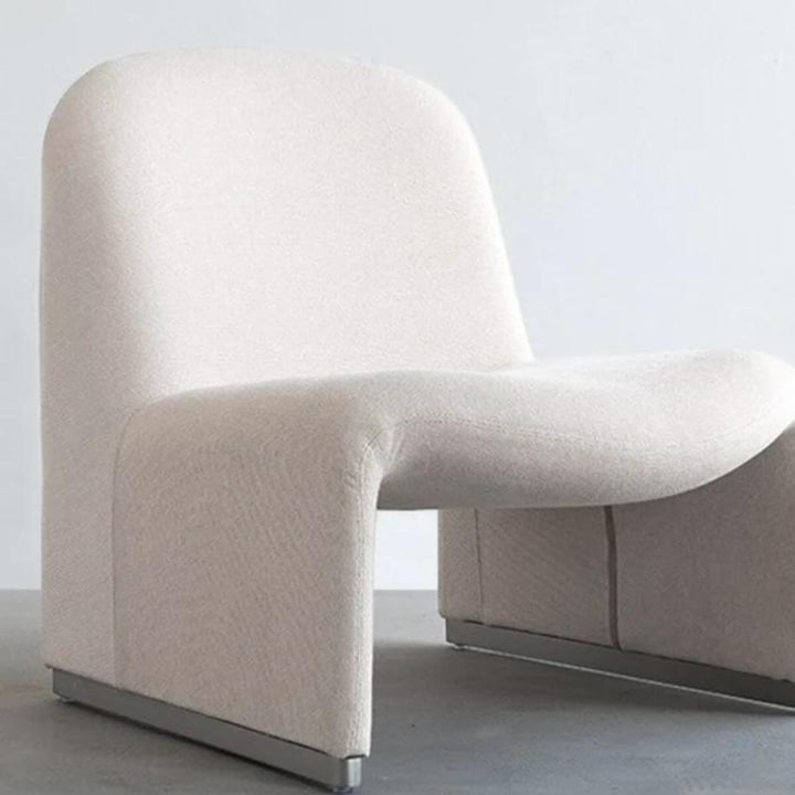 Side view of white cotton-linen armless accent armchair in Australia with modern minimalist design