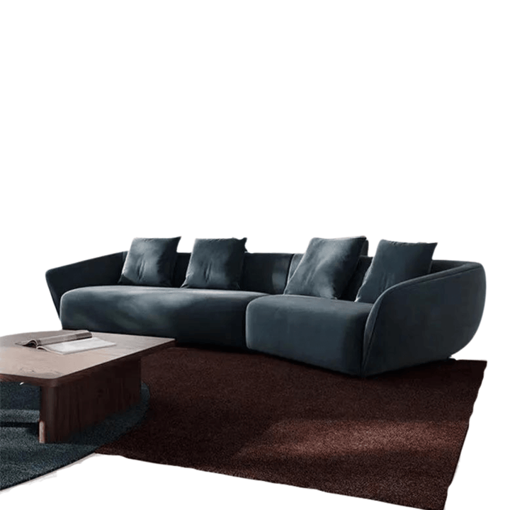 Curved velvet 3-seater sofa in Australia shown in stylish modern living room setting