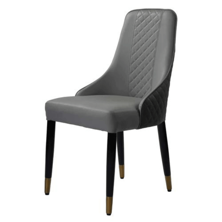 Side view of Ascot leather dining chair, featuring smooth leather and elegant modern design